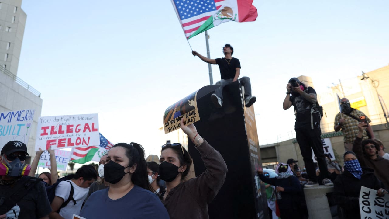 People protest against U.S. Immigration and Customs Enforcement (ICE) and U.S. President Donald Trump's immigration policies outside the Metropolitan Detention Center (MDC) in Los Angeles, California, U.S., January 30, 2026. 