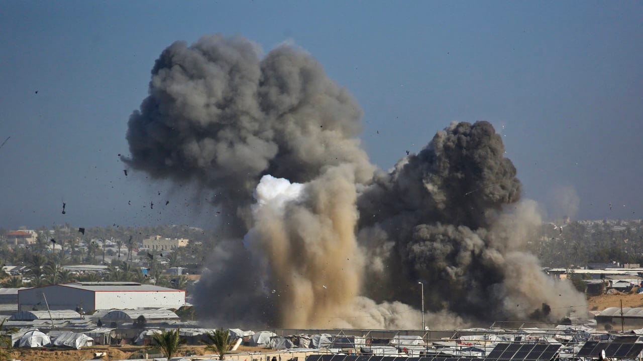 Smoke rises from the Gath shelter, housing displaced Palestinians, after an Israeli air strike in the west of Khan Yunis, southern Gaza Strip on January 31, 2026.