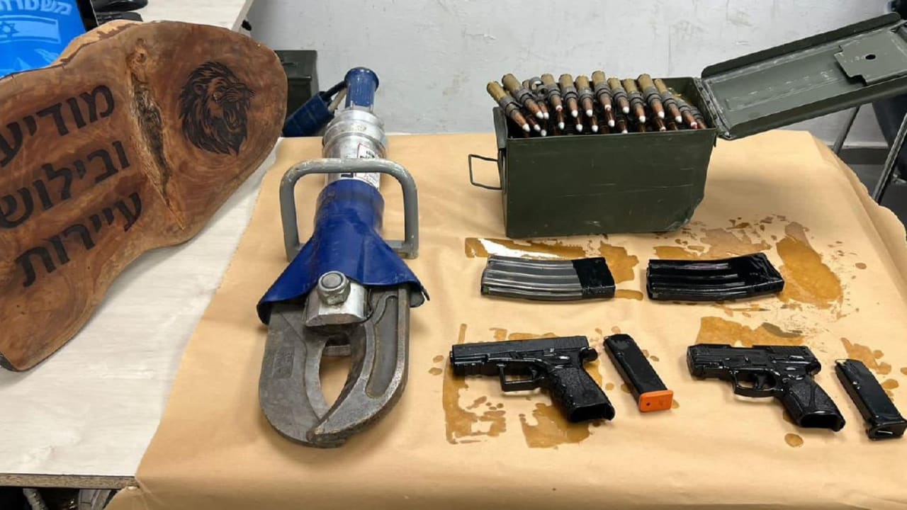 Two handguns, an explosive device, ammunition, and magazines seized from a school compound in Lakiya, Feb 4, 2026.