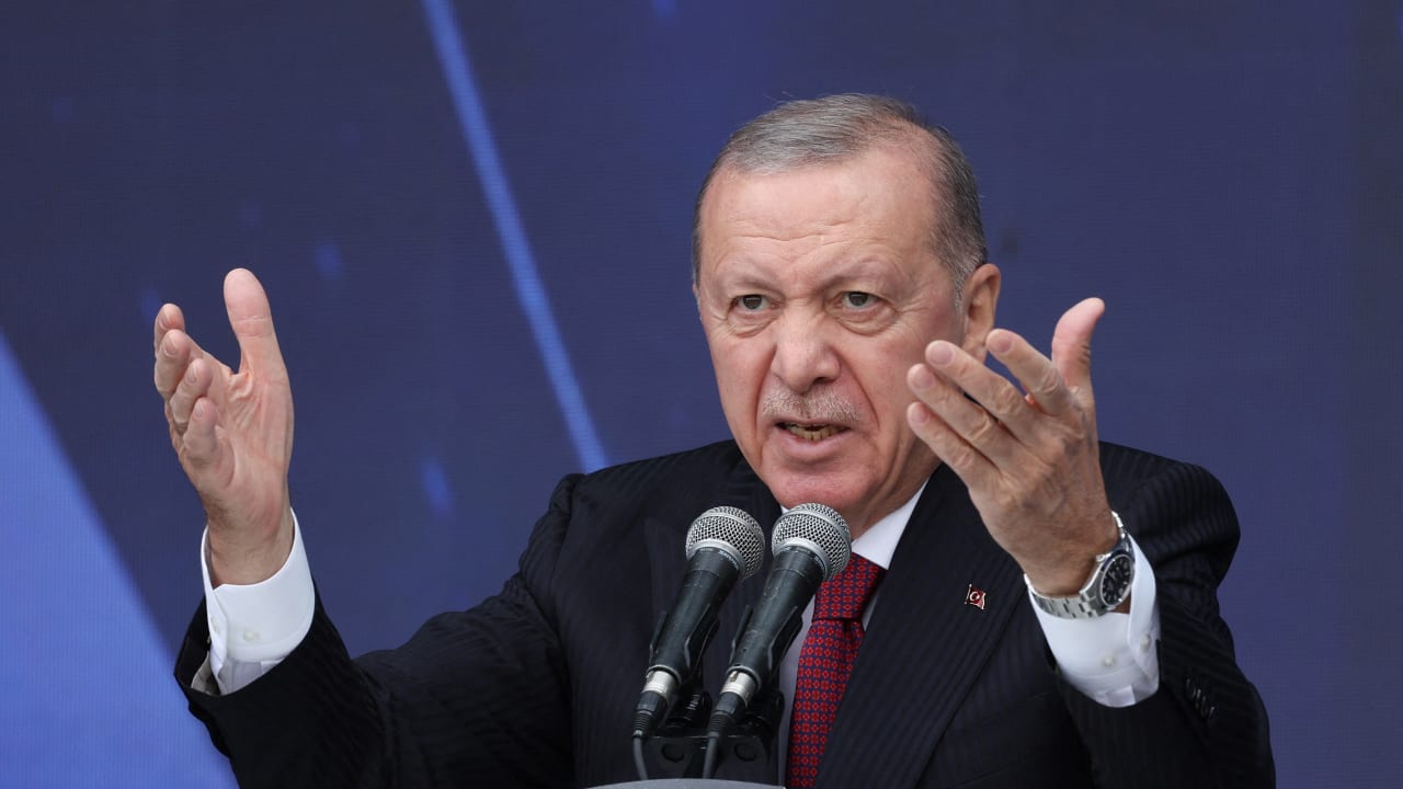 Turkish President Tayyip Erdogan speaks during a ceremony for the handover of new vehicles to the gendarmerie and police forces in Istanbul, Turkey, November 28, 2025.