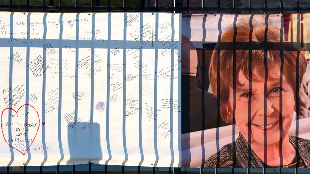 A banner with a growing collection of well-wishes from supporters reads "bring her home" (not pictured) and shows a photo of Nancy Guthrie, the 84-year-old mother of US journalist and television host Savannah Guthrie, Tucson, Arizona, US, February 14, 2026