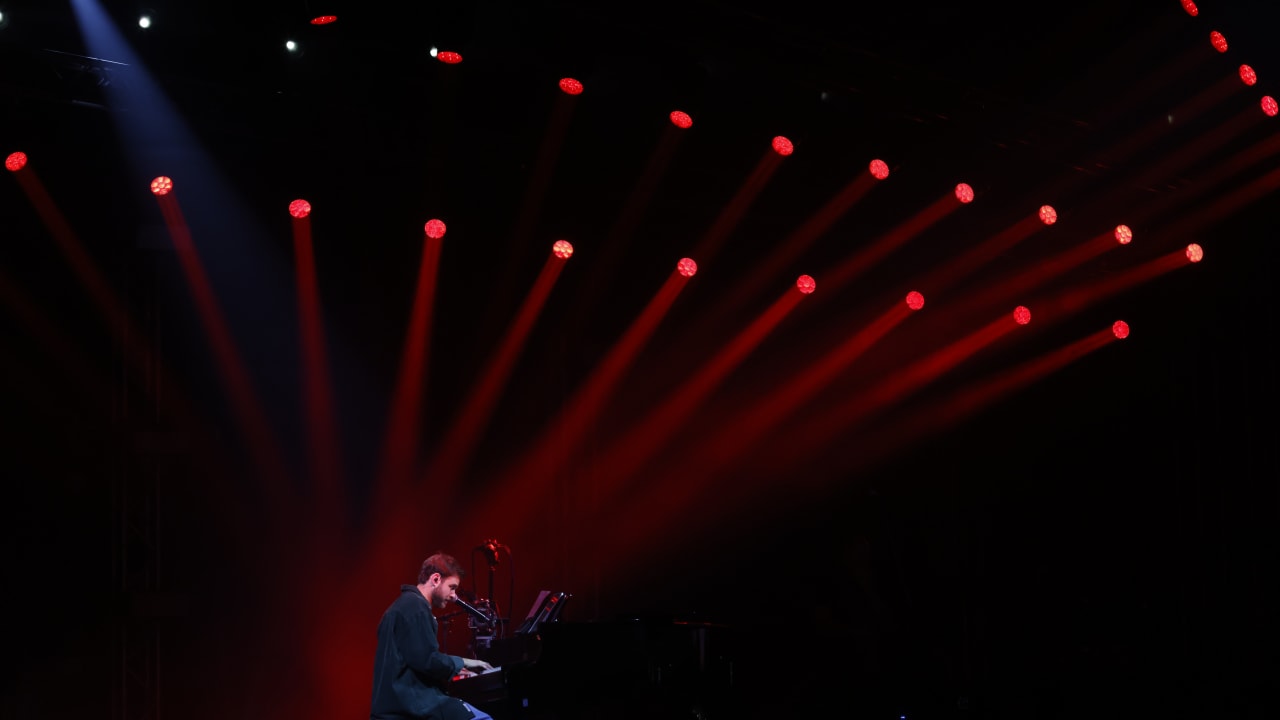 Former hostage Alon Ohel performs with Israeli artists during a concert in Tel Aviv, on February 9, 2026. 