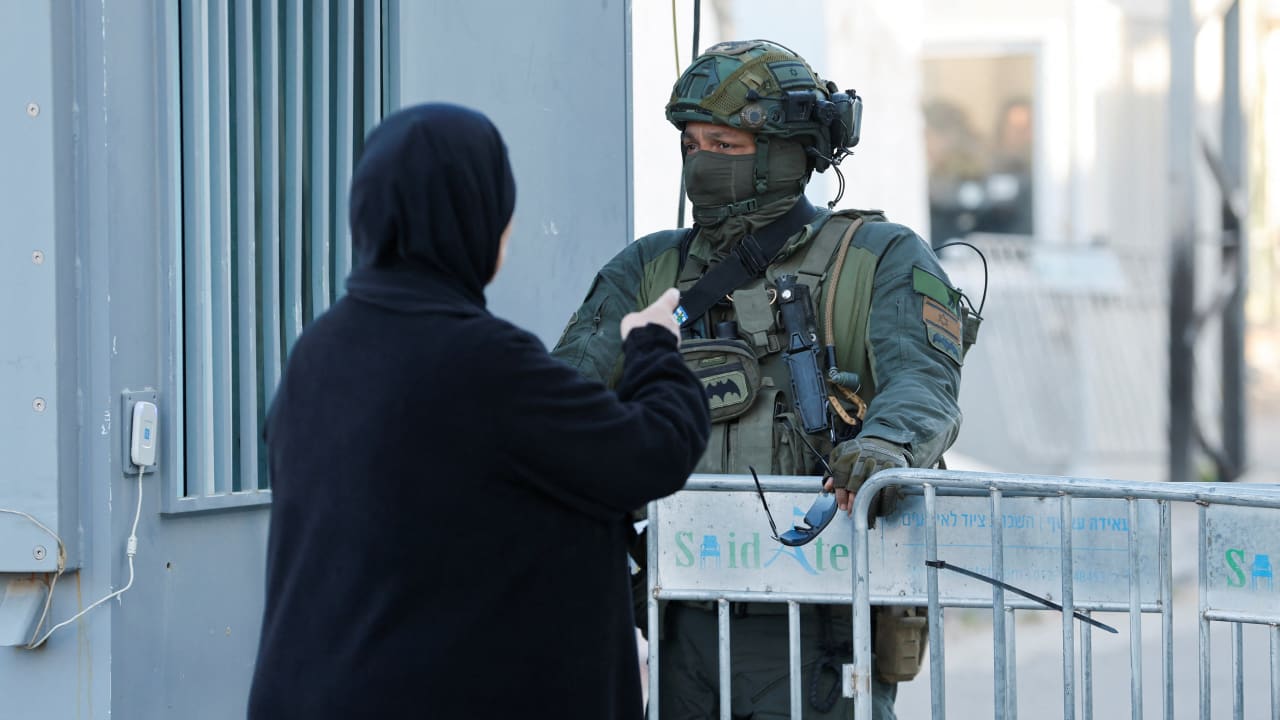 AN ISRAELI soldier checks the ID of a Palestinian woman at an Israeli checkpoint, on the day Palestinians make their way to the Temple Mount, in Jerusalem's Old City, to attend the first Friday prayers during the Muslim holy fasting month of Ramadan, in Bethlehem, the West Bank, February 20, 2026.