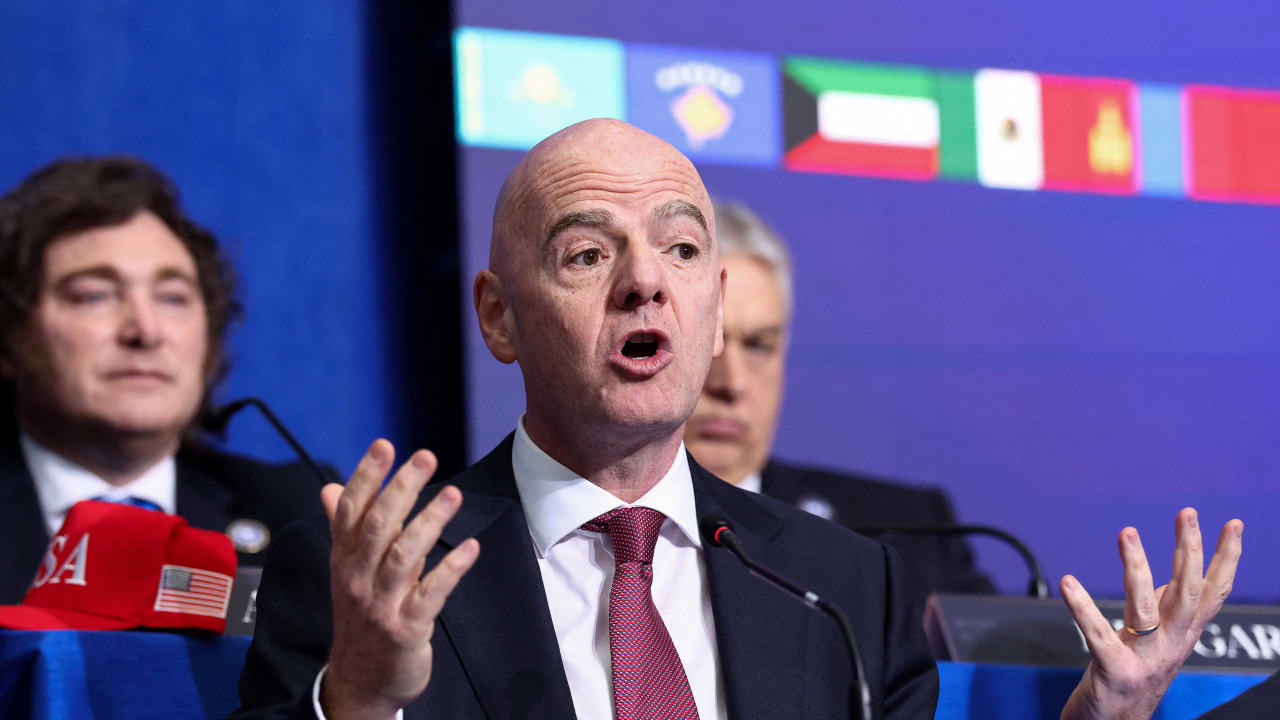FIFA president Gianni Infantino speaks, as he and Argentina's President Javier Milei attend the inaugural Board of Peace meeting at the U.S. Institute of Peace in Washington, DC, US, February 19, 2026.