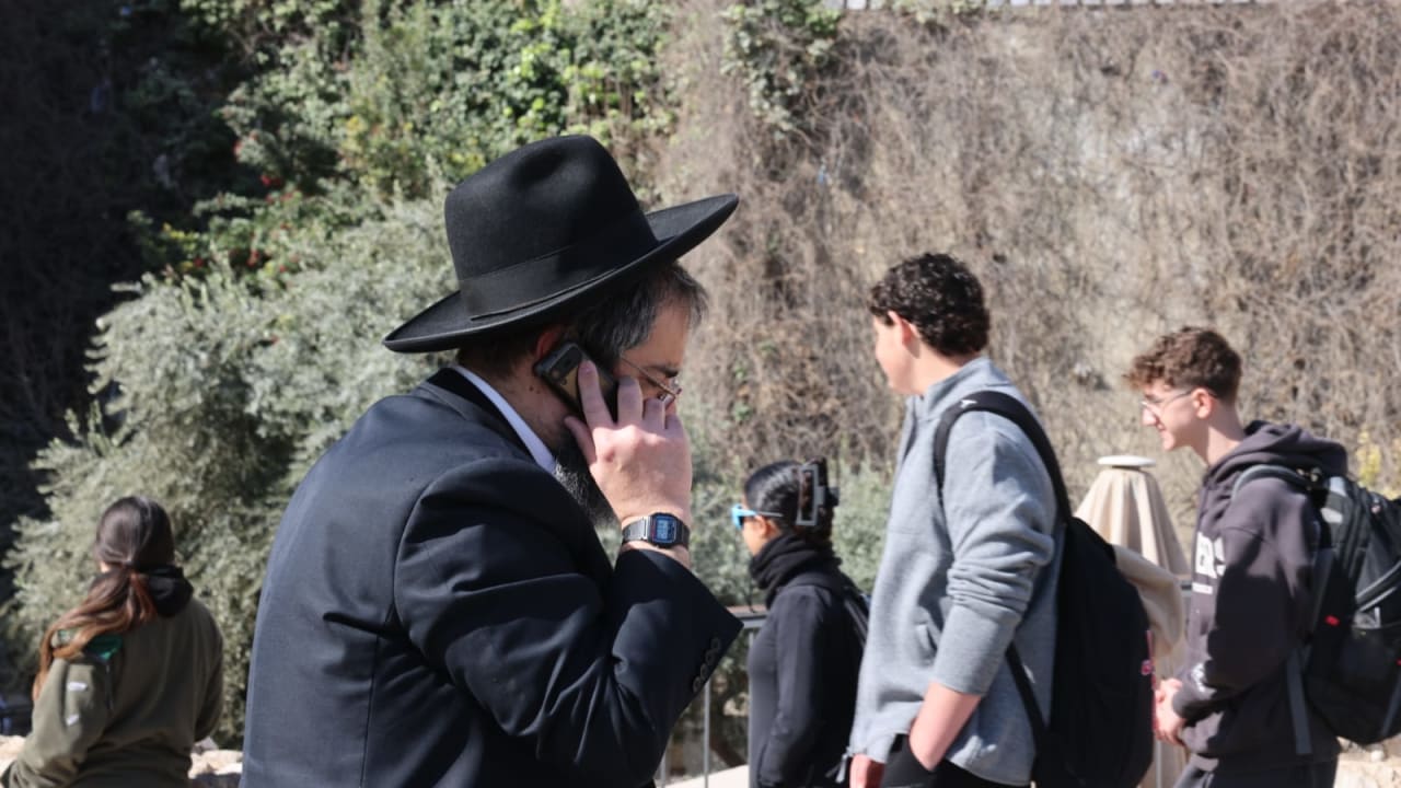 A haredi man speaking on his kosher phone in Jerusalem on February 23, 2026. 