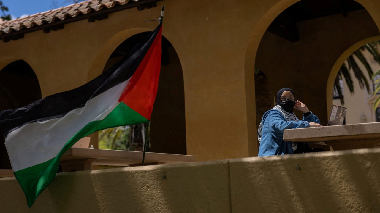 A student attends an event at a protest encampment in support of Palestinians at Stanford University during the ongoing conflict between Israel and the Palestinian Islamist group Hamas, in Stanford, California, April 26, 2024.