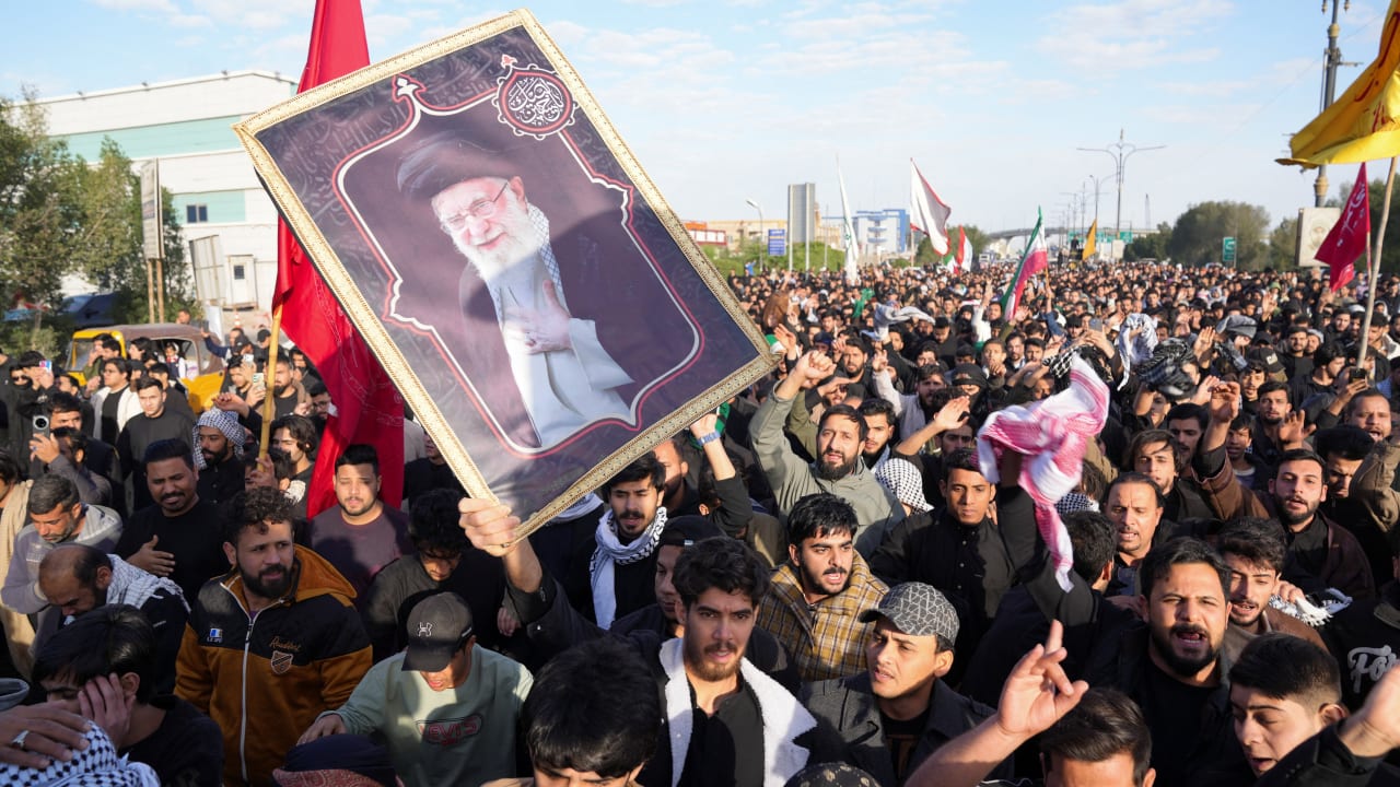 People march after Iran’s Supreme Leader Ayatollah Ali Khamenei was killed in Israeli and U.S. strikes, in Basra, Iraq, March 1, 2026. 