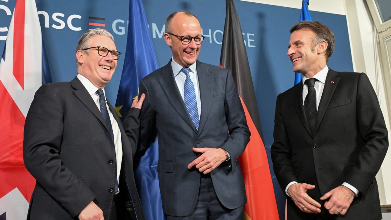 German Chancellor Friedrich Merz, French President Emmanuel Macron and British Prime Minister Keir Starmer pose at the start of the E-3 meeting, during the Munich Security Conference (MSC), in Munich, Germany February 13, 2026.