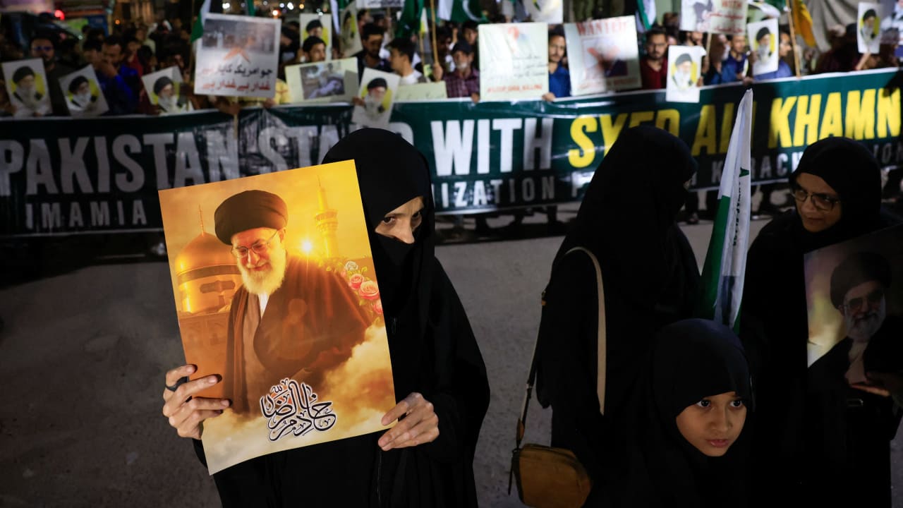Shiite Muslim supporter of the Imamia Student Organization (ISO) holds a portrait of Iran's Supreme Leader Ayatollah Ali Khamenei during a protest against Israel and the US strikes on Iran, in Karachi, Pakistan February 28, 2026.