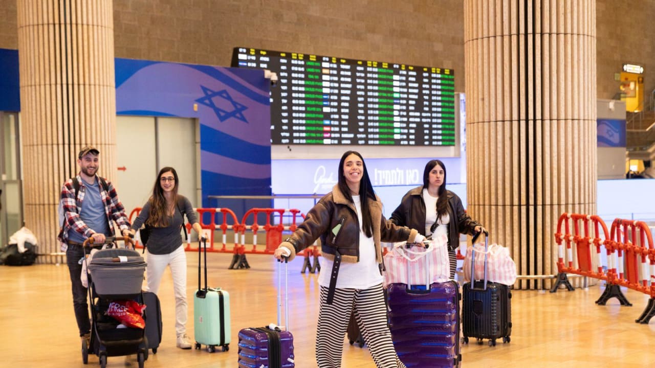 ISRAELIS RETURN in the first El Al flight to Israel since the beginning of Operation Roaring Lion, March 5, 2026.
