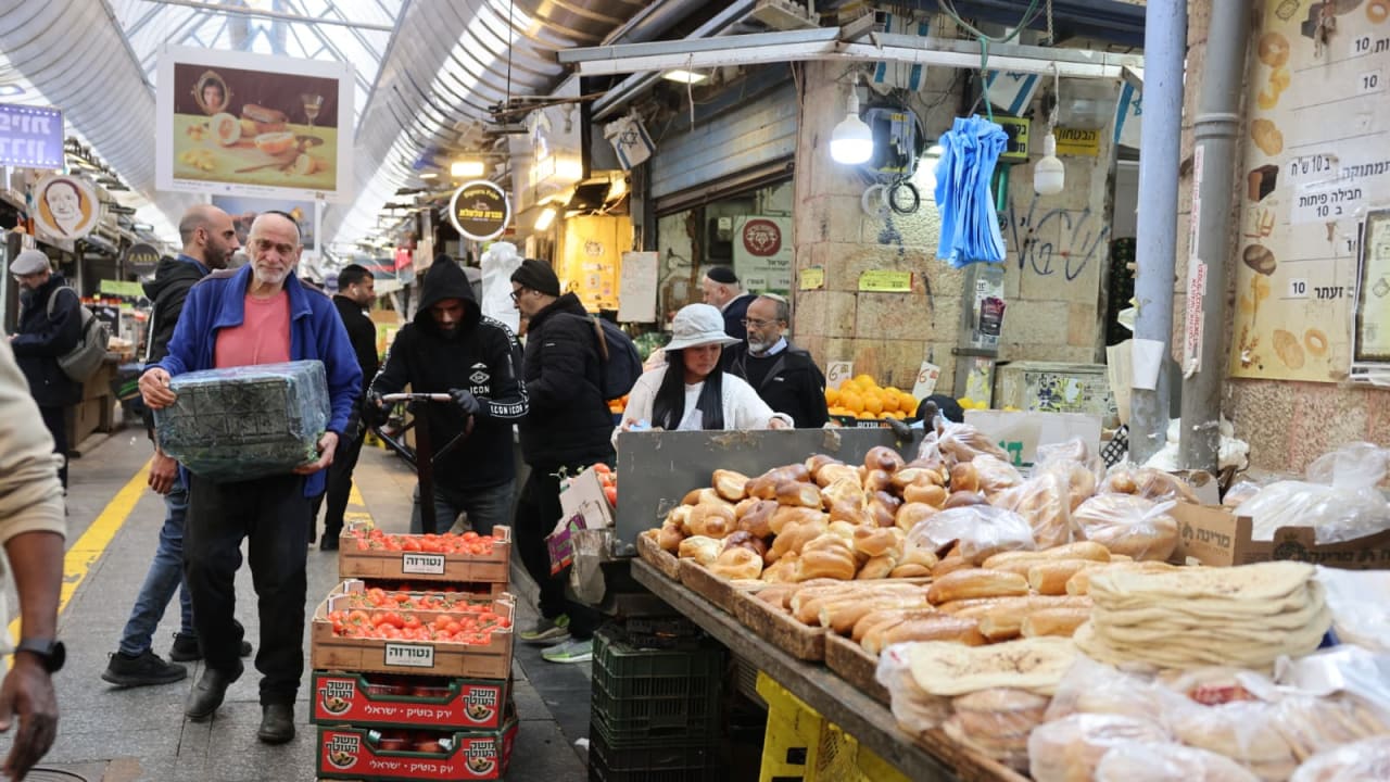 Jerusalem's Mahane Yehuda market bustles as the war in Iran rages, March 5, 2026