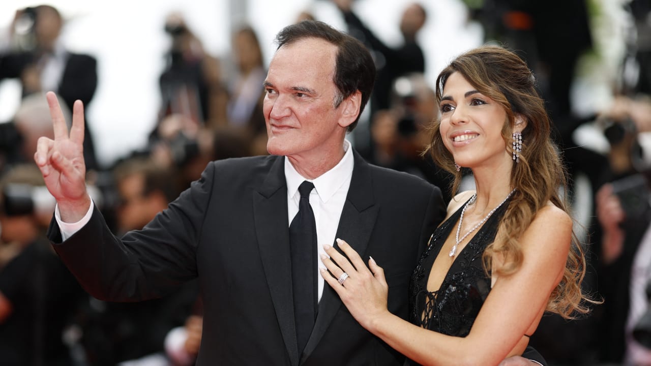 Quentin Tarantino and Daniella Pick pose on the red carpet during arrivals for the screening of the film "Nouvelle Vague" in competition at the 78th Cannes Film Festival in Cannes, France, May 17, 2025.