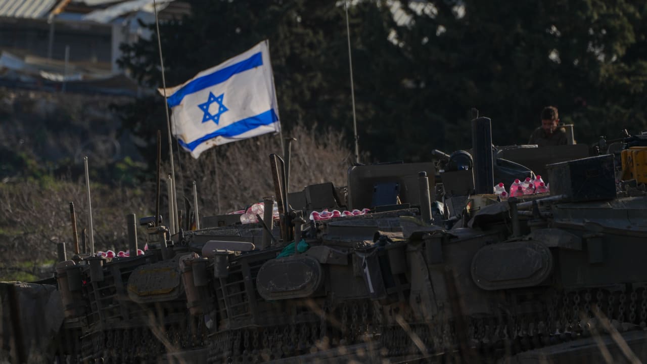 Israeli military vehicles and tanks are seen along the border with Lebanon, March 7, 2026