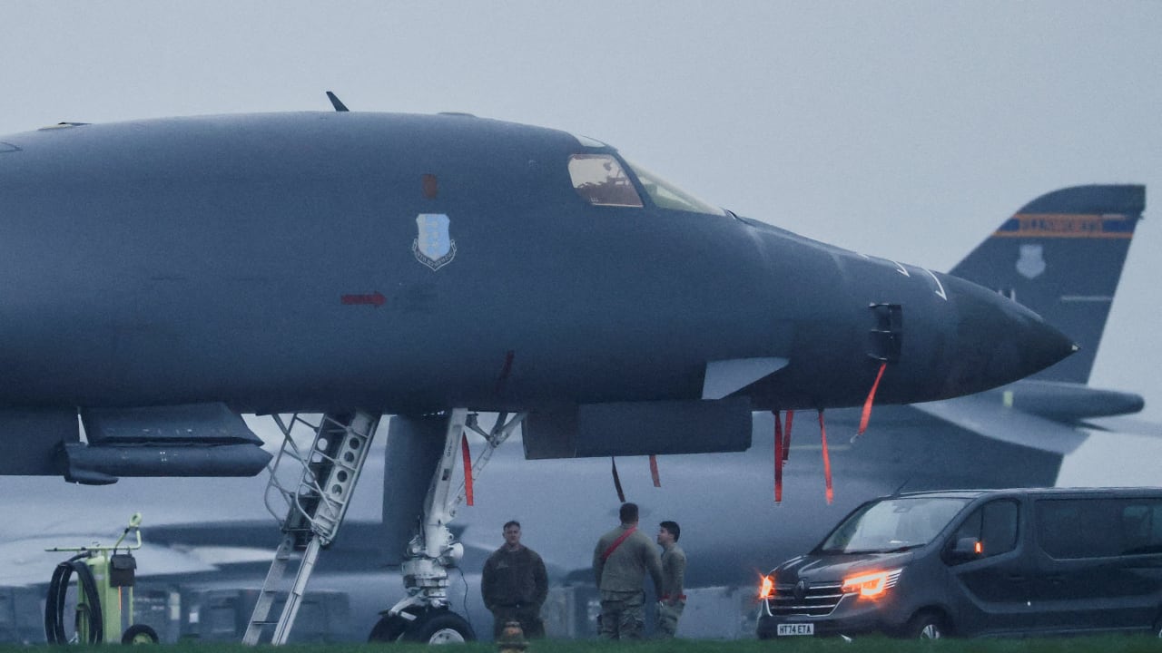 United States Air Force (USAF) military personnel work on a USAF B-1B bomber, at RAF Fairford airbase, amid the U.S.–Israeli conflict with Iran, in Fairford, Britain, March 8, 2026.