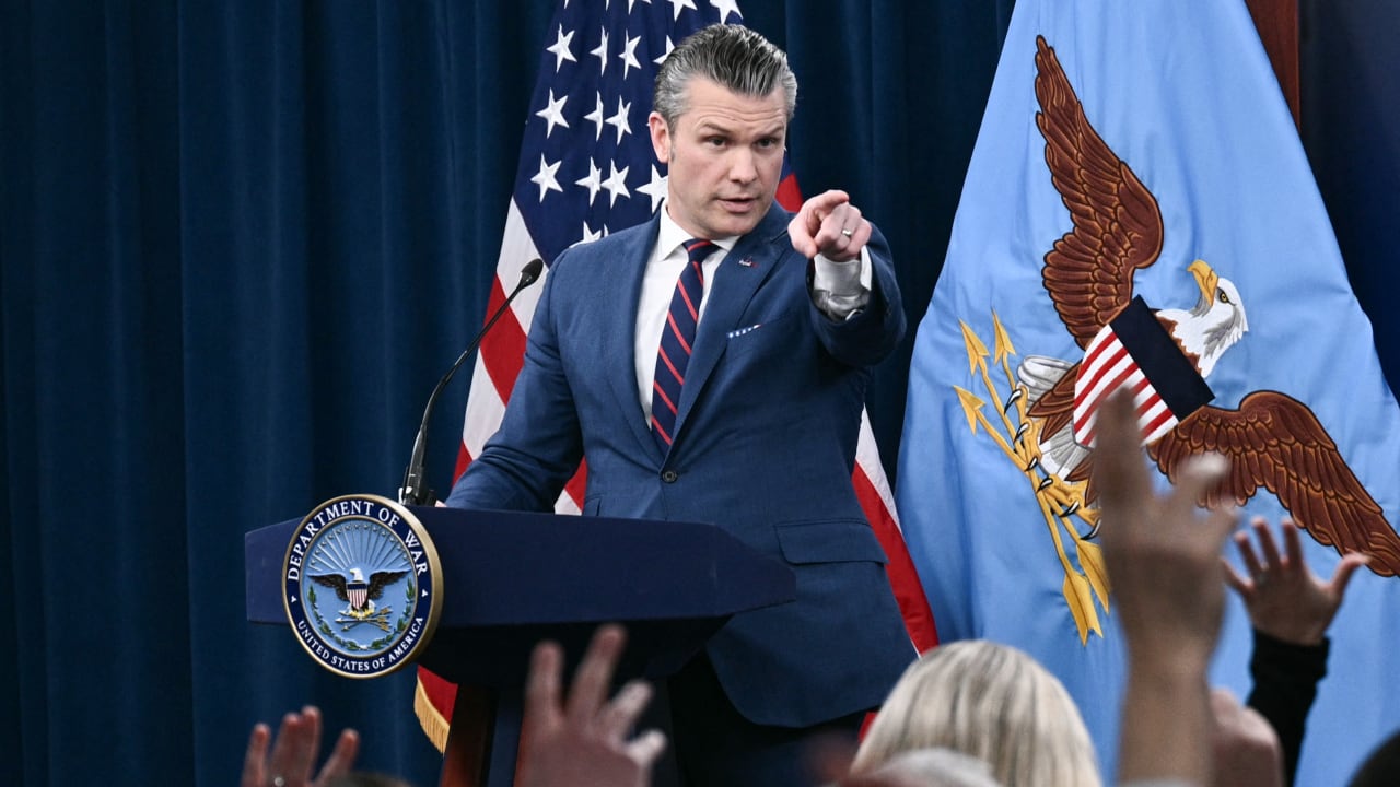 US War Secretary Pete Hegseth takes questions during a press conference on US military action in Iran, at the Pentagon in Washington, DC.