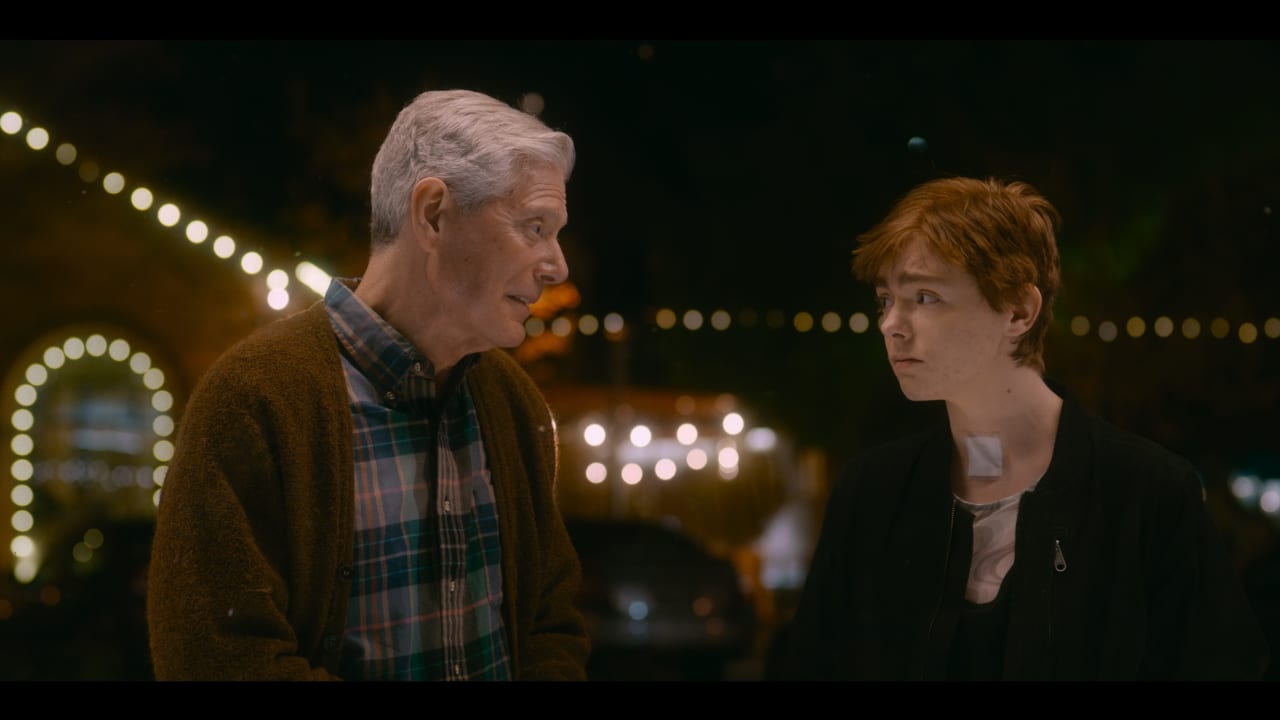 STEPHEN LANG and Elsie Fisher in ‘The Optimist.’