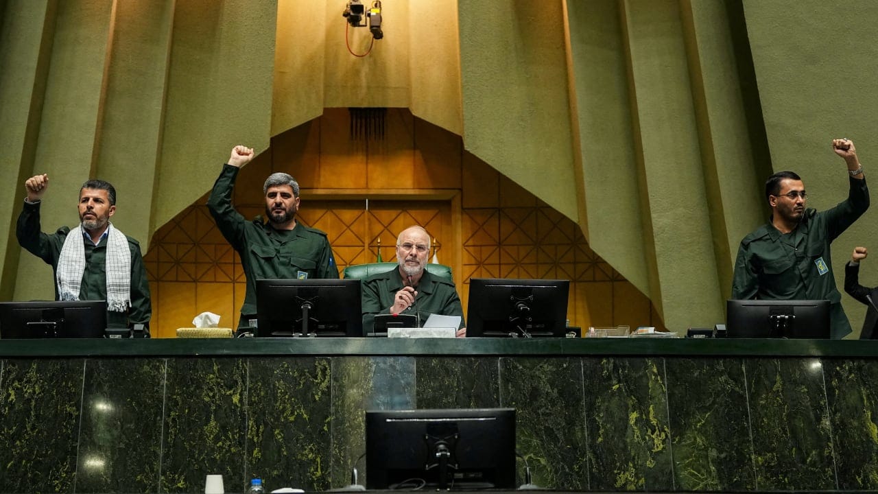 Iranian Parliament Speaker Mohammad Bagher Ghalibaf looks on as parliament members chant in support of the IRGC while wearing military uniforms in Tehran, Iran, February 1, 2026; illustrative. (photo credit: Hamed Malekpour/Islamic consultative assembly news agency/WANA/Handout via REUTERS)