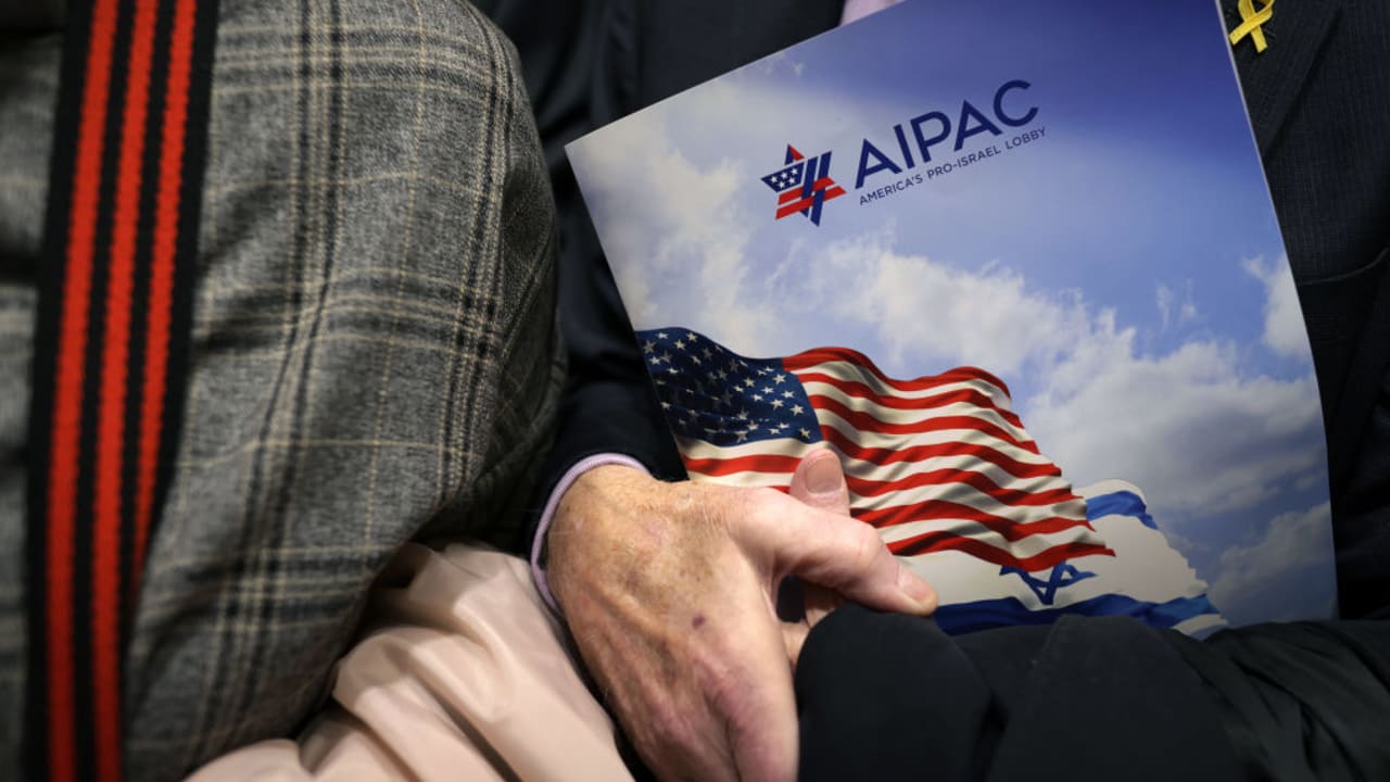 A VISITOR holds an AIPAC folder in an elevator in Rayburn House Office Building on March 12, 2024 on Capitol Hill in Washington, DC. 