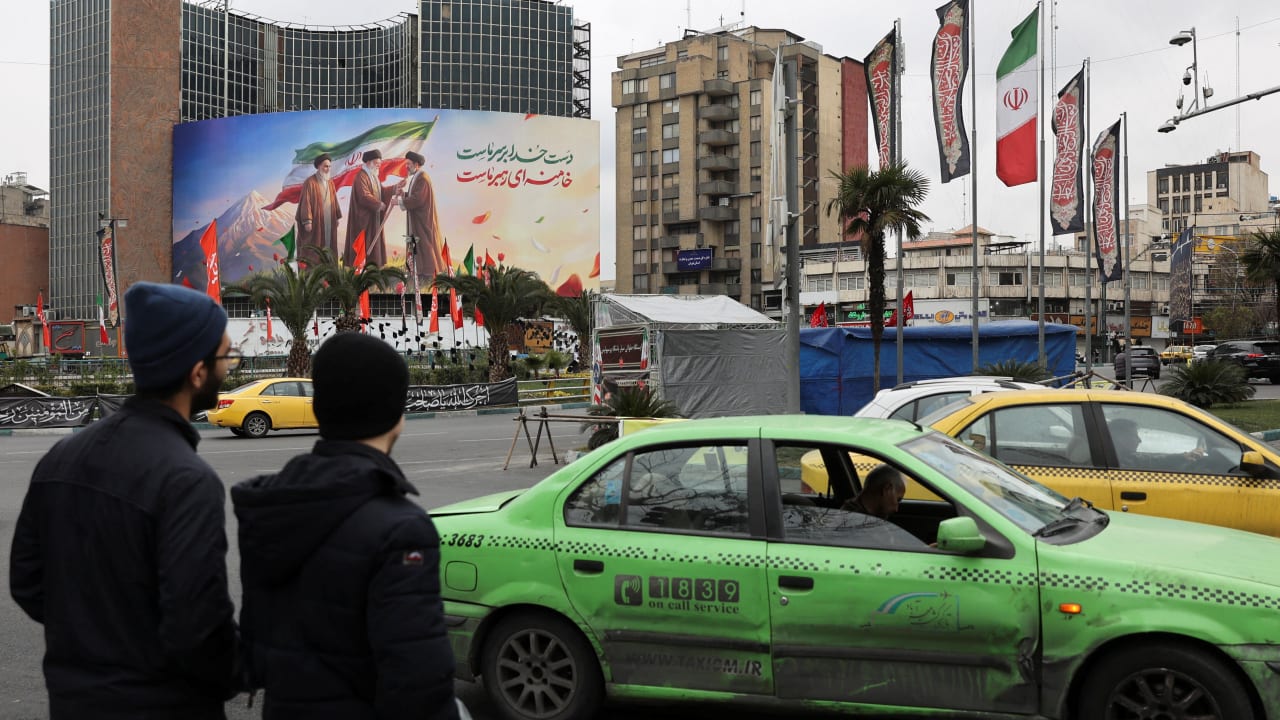 A banner of Iran's new supreme leader Mojtaba Khamenei with former supreme leaders Ali Khamenei and Ruhollah Khomeini, in Tehran, Iran, March 10, 2026