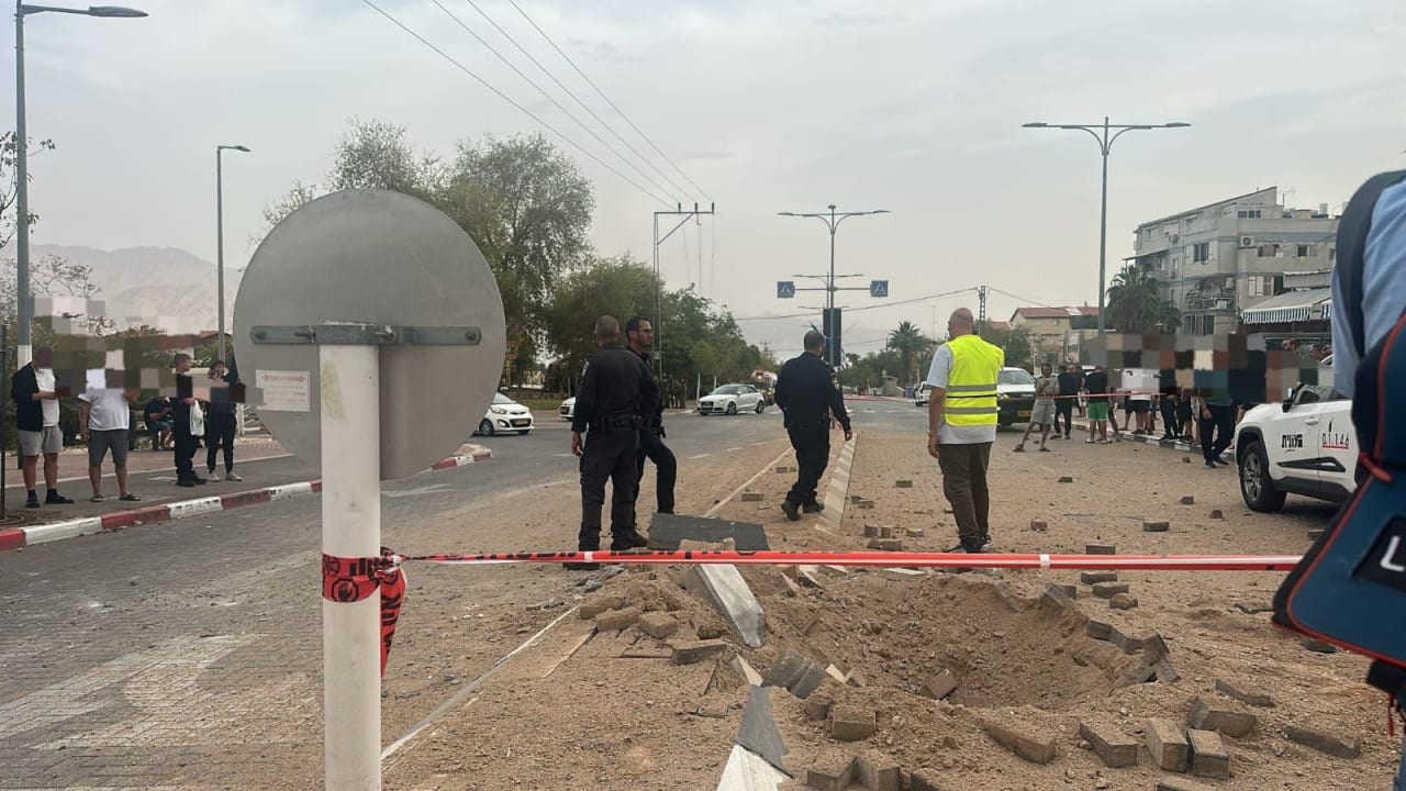 Authorities work at the scene of a fall in southern israel on March 14, 2026.