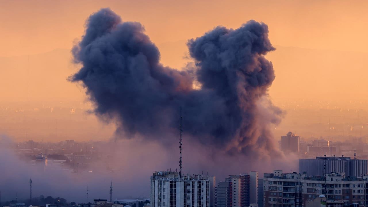 A plume of smoke rises after a strike on the Iranian capital Tehran, on March 3, 2026.
