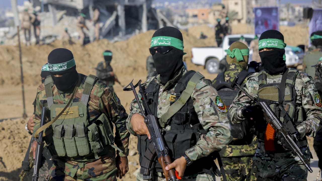 Hamas terrorists gather during a public event in Khan Younis, Gaza, on February 1, 2025. 