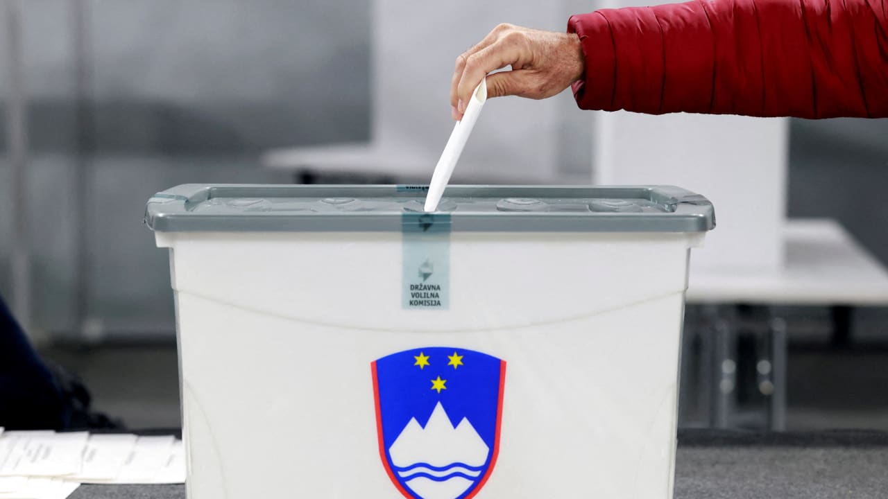 A person votes during the early voting ahead of national elections, in Ljubljana, Slovenia March 17, 2026. 