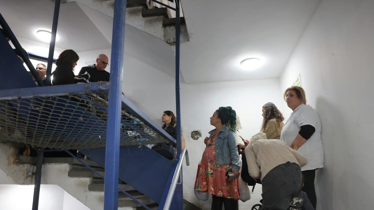 Israelis descend a stairwell towards a "protected space" in Jerusalem amid Israel's war with Iran, March 17, 2026.