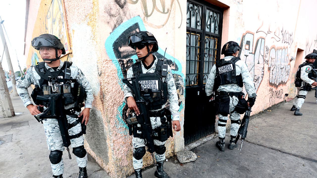 MEMBERS OF the National Guard guard the perimeter of the La Paz funeral home in Guadalajara, Jalisco state, Mexico, on March 1, 2026. 