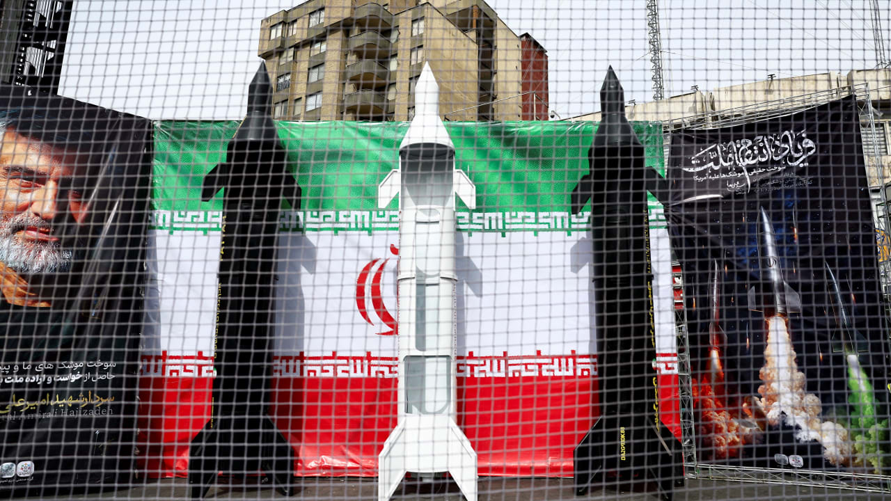 Symbolic mock-ups of Iranian missiles are displayed on a street, amid the U.S.-Israeli conflict with Iran, in Tehran, Iran, March 22, 2026.