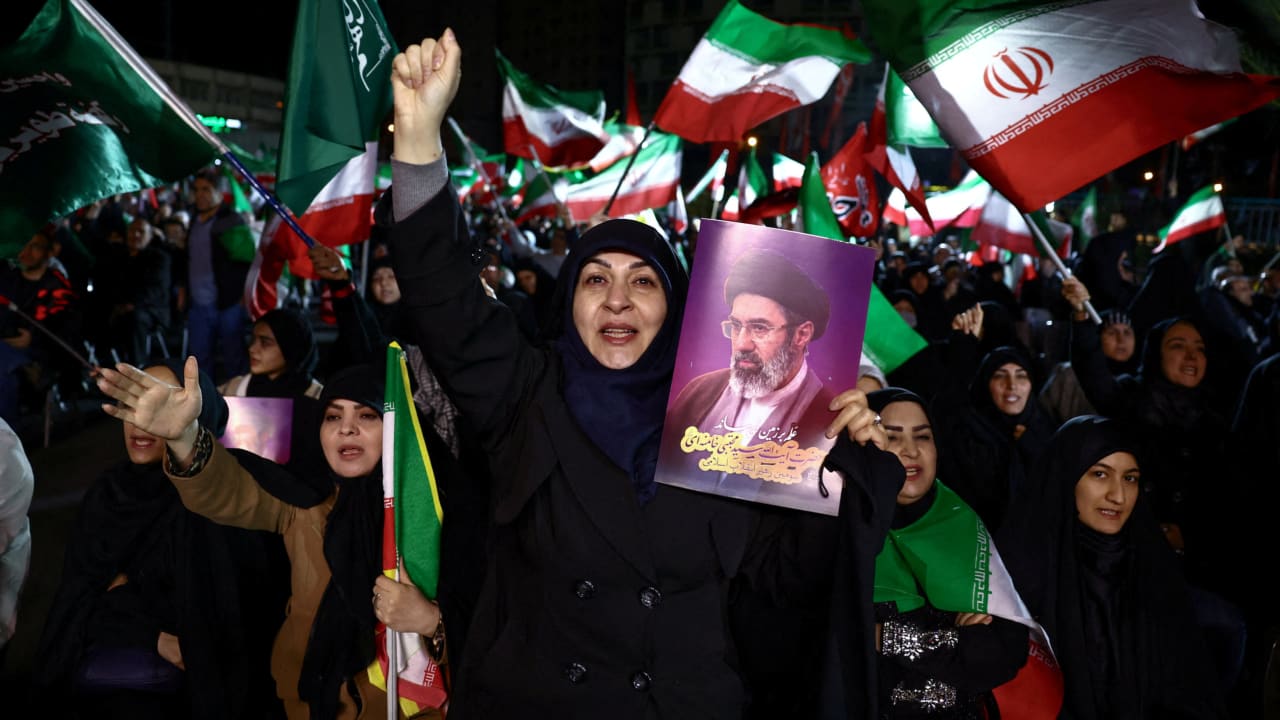 People attend an anti-US and Israeli rally, amid the US-Israeli conflict with Iran, in Tehran, Iran, March 22, 2026.