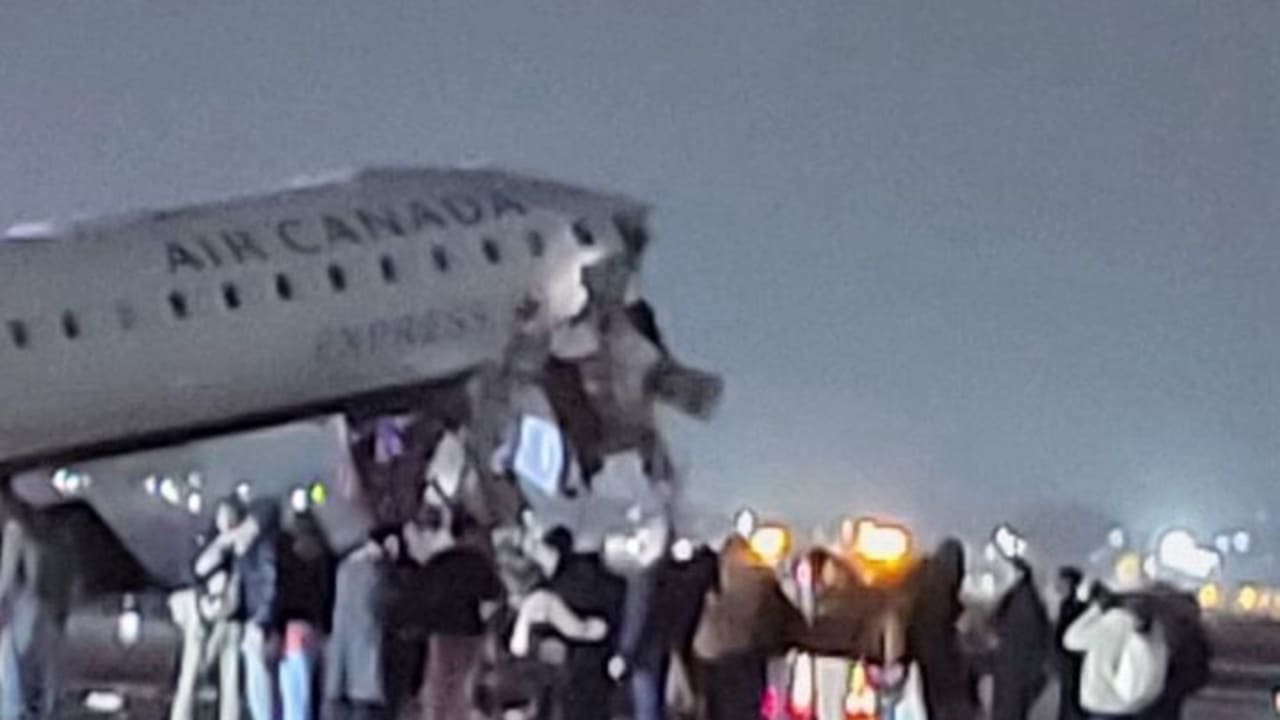 The aftermath of an Air Canada plane colliding with a fire truck at New York's La Guardia Airport, March 23, 2026.