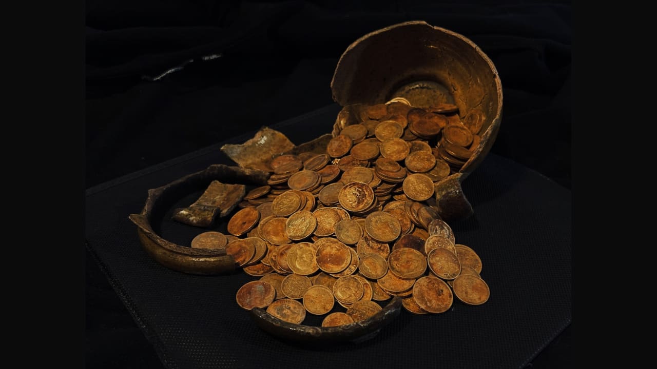 Hoard of gold rubles found under a house in western Russia, March 25, 2026. (photo credit: The Institute of Archaeology of the Russian Academy of Sciences)