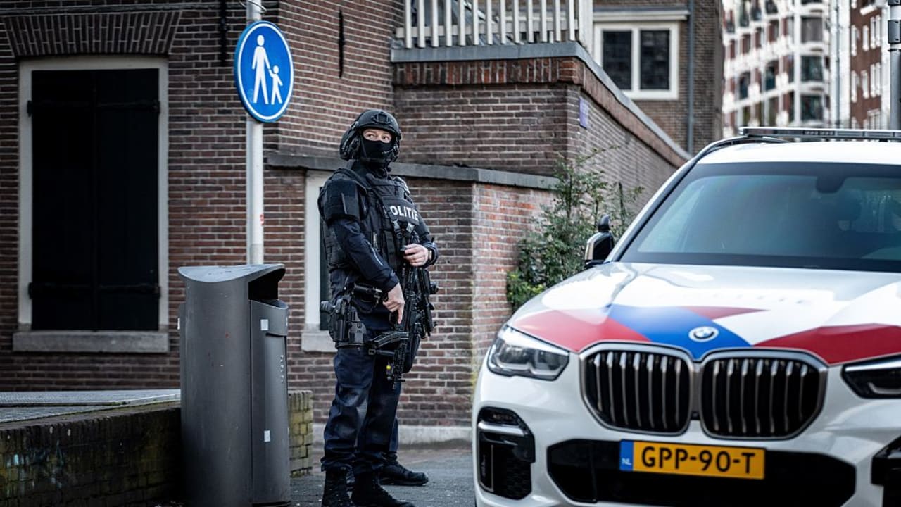 A POLICE officer stands guard in front of the Jewish Museum on Nieuwe Amstelstraat in Amsterdam on March 14, 2026. 