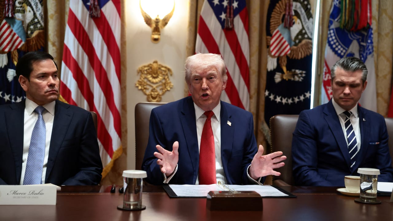 US President Donald Trump, sitting next to Secretary of State Marco Rubio and Defense Secretary Pete Hegseth, holds a cabinet meeting at the White House in Washington, DC, US, March 26, 2026.