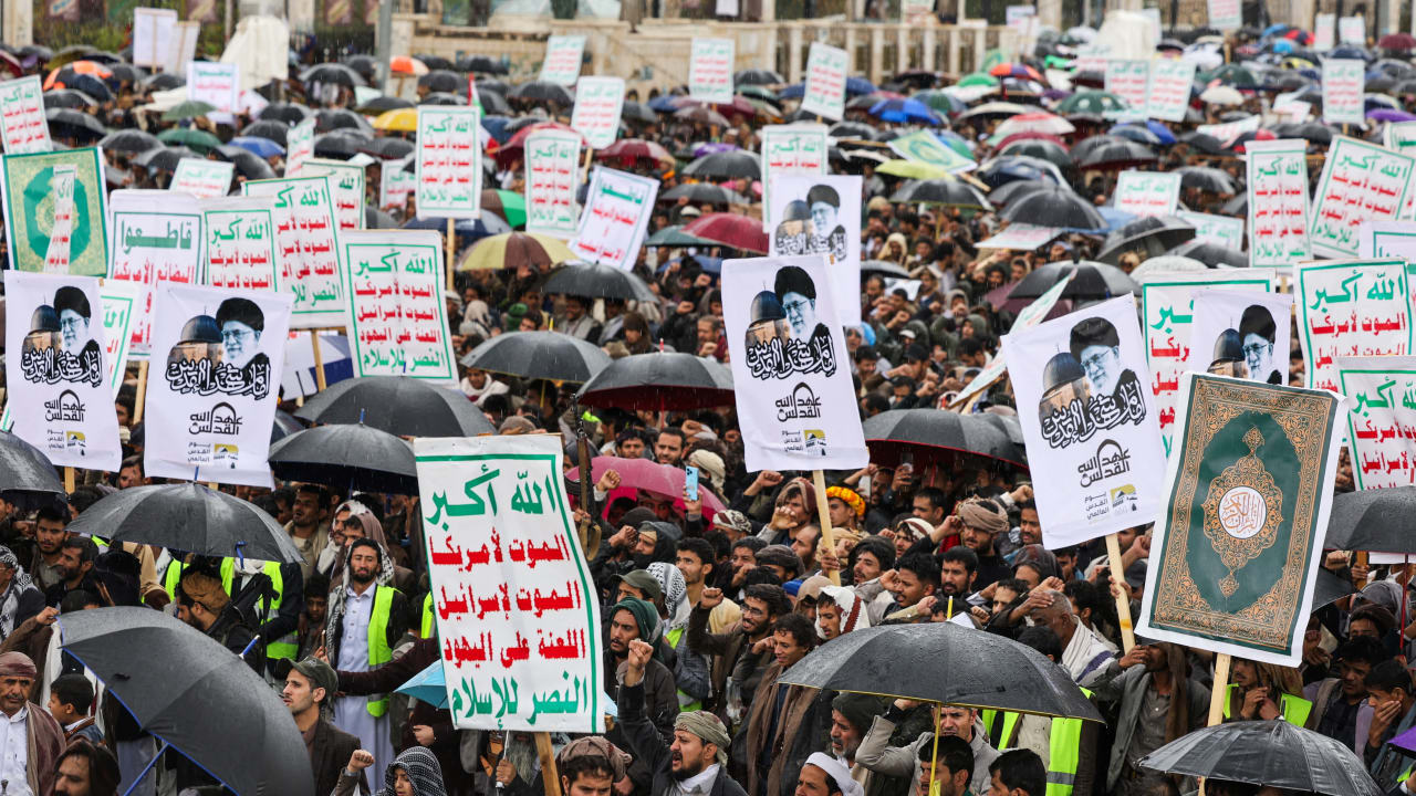 Houthi supporters carry placards featuring images of late Iranian Supreme Leader Ayatollah Ali Khamenei during a rally to mark the al-Quds Day (Jerusalem Day), in Sanaa, Yemen, March 13, 2026