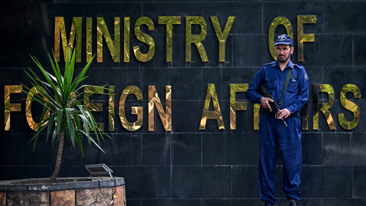 A private security officer keeps vigil outside Pakistan's Ministry of Foreign Affairs in Islamabad on March 26, 2026.