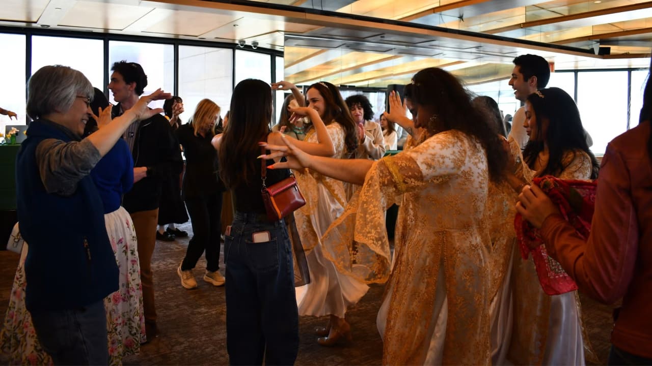 Festival goers dance at the Nowruz spring equinox festival at the Museum of Jewish Heritage.