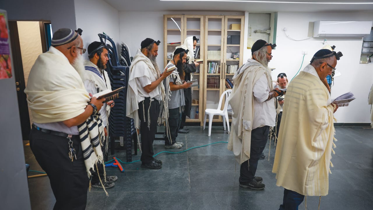 Prayer in a Safed bomb shelter.