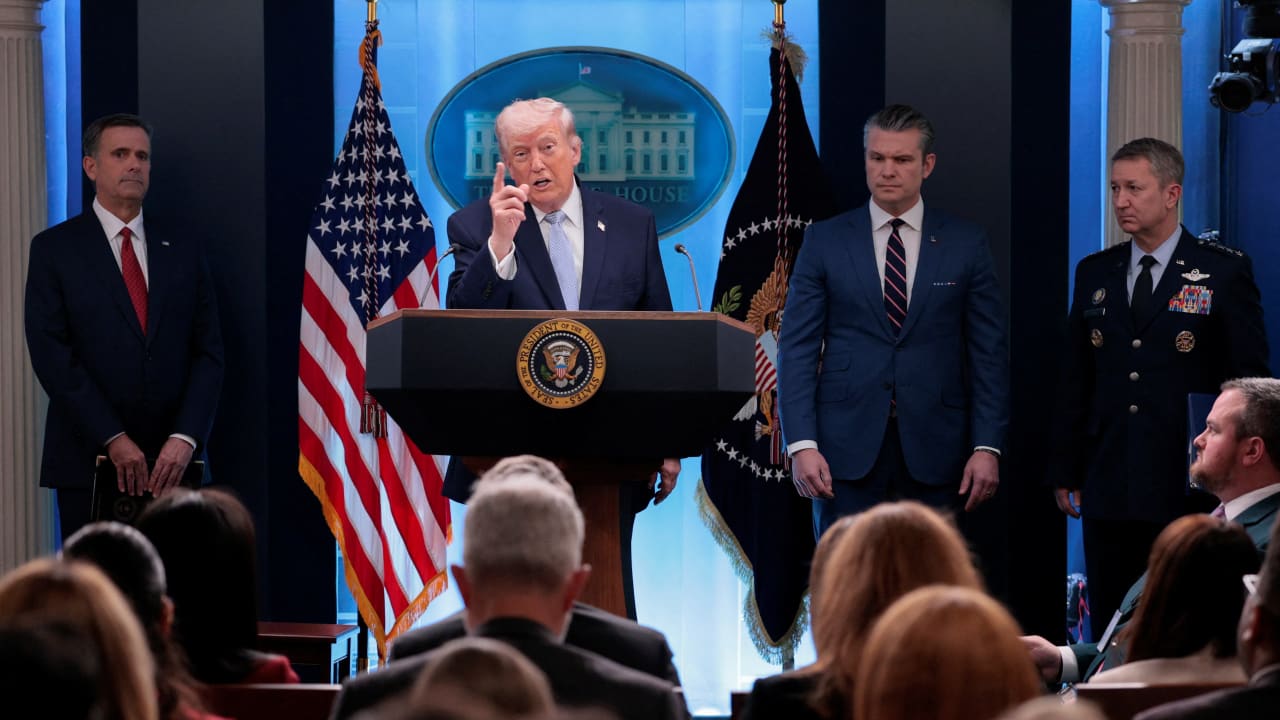 US PRESIDENT Donald Trump speaks, while Secretary of Defense Pete Hegseth looks on, as they hold a press conference in the James S. Brady Press Briefing Room at the White House in Washington, DC, US, April 6, 2026.
