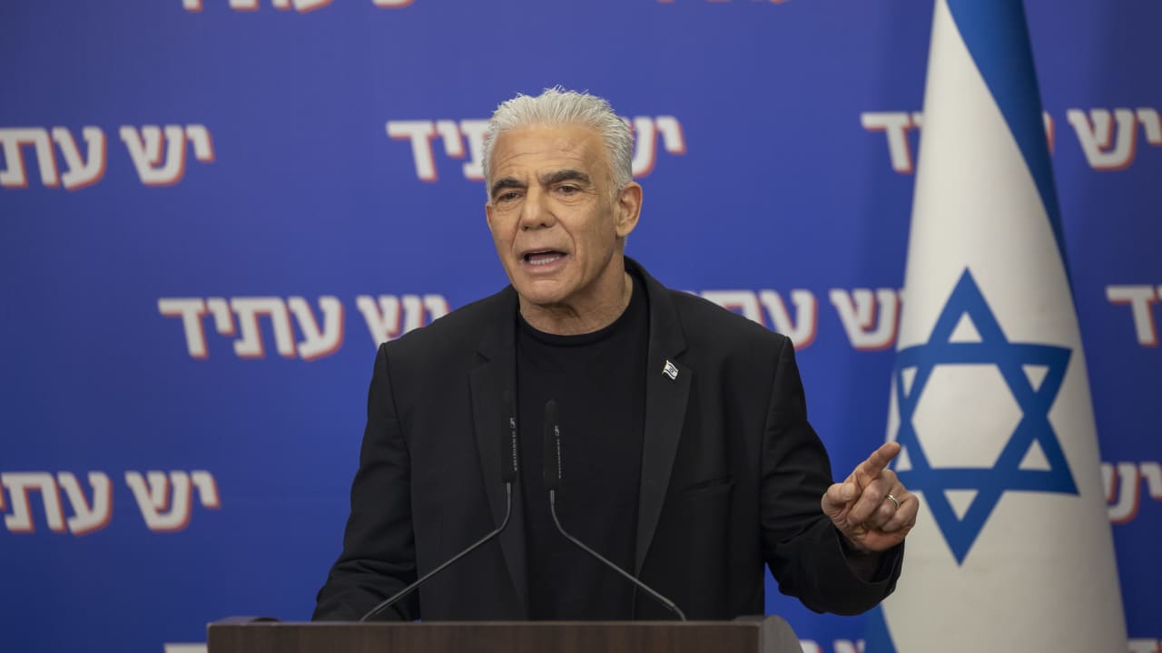 Opposition head Yair Lapid and MK Meirav Ben-Ari deliver a joint statement at the Knesset, the Israeli parliament in Jerusalem, March 30, 2026.
