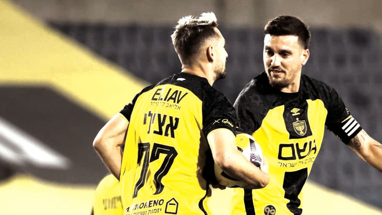 BEITAR JERUSALEM players celebrate a dramatic late winner at Teddy Stadium – their joy echoing through empty stands as fans cheer from afar in homes and shelters across Israel. 
