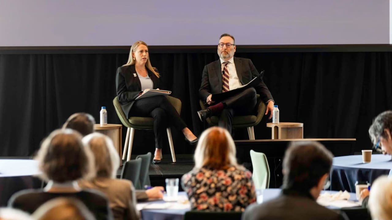 (L-r) Andrea Lucas, chair of the federal Equal Employment Opportunity Commission, speaks with Brandeis Center founder Kenneth Marcus at an antisemitism conference held at Harvard University in Cambridge, Massachusetts, April 16, 2026.