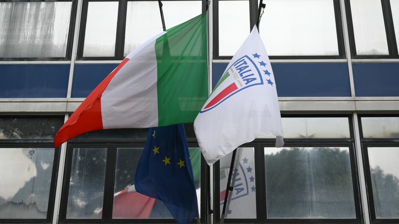 A picture shows flags of Italy and of the Italian Football Federation (FIGC) at the Italian Football Federation (FIGC) headquarters during a meeting of the Italian football authorities after the national team failed to qualify for a third consecutive World Cup, in Rome on April 2, 2026.