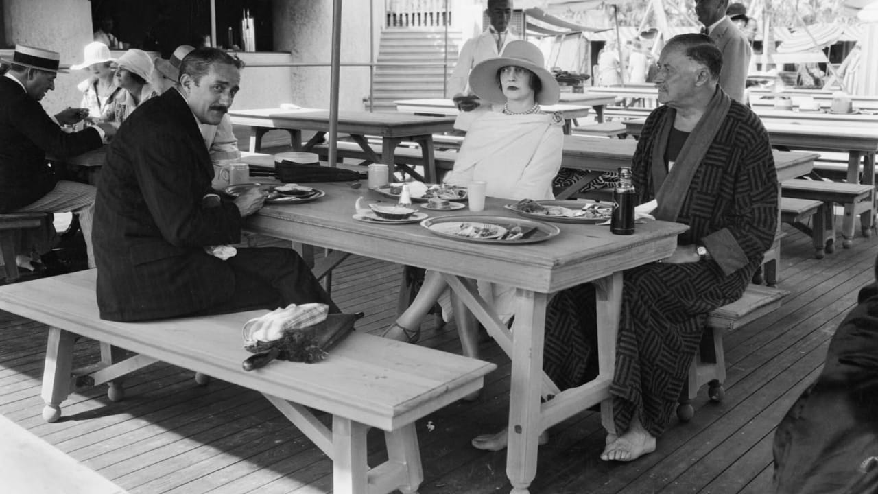 "Sojourning at the exclusive Palm Beach Bath and Tennis Club in Florida are L to R; Mr. and Mrs. Jerome Napoleon Bonaparte of New York and Newport, and Mr. Paris Singer of London and the Riviera. All socially prominent," Feb. 16, 1927.
