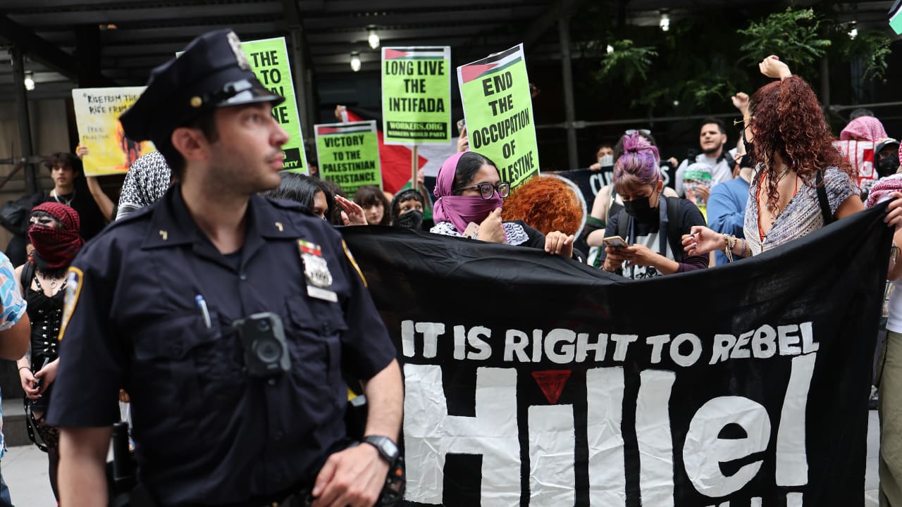 Pro-Palestine protesters hold a rally against the Baruch College Hillel campus organization at Baruch College in New York City, June 5, 2024.