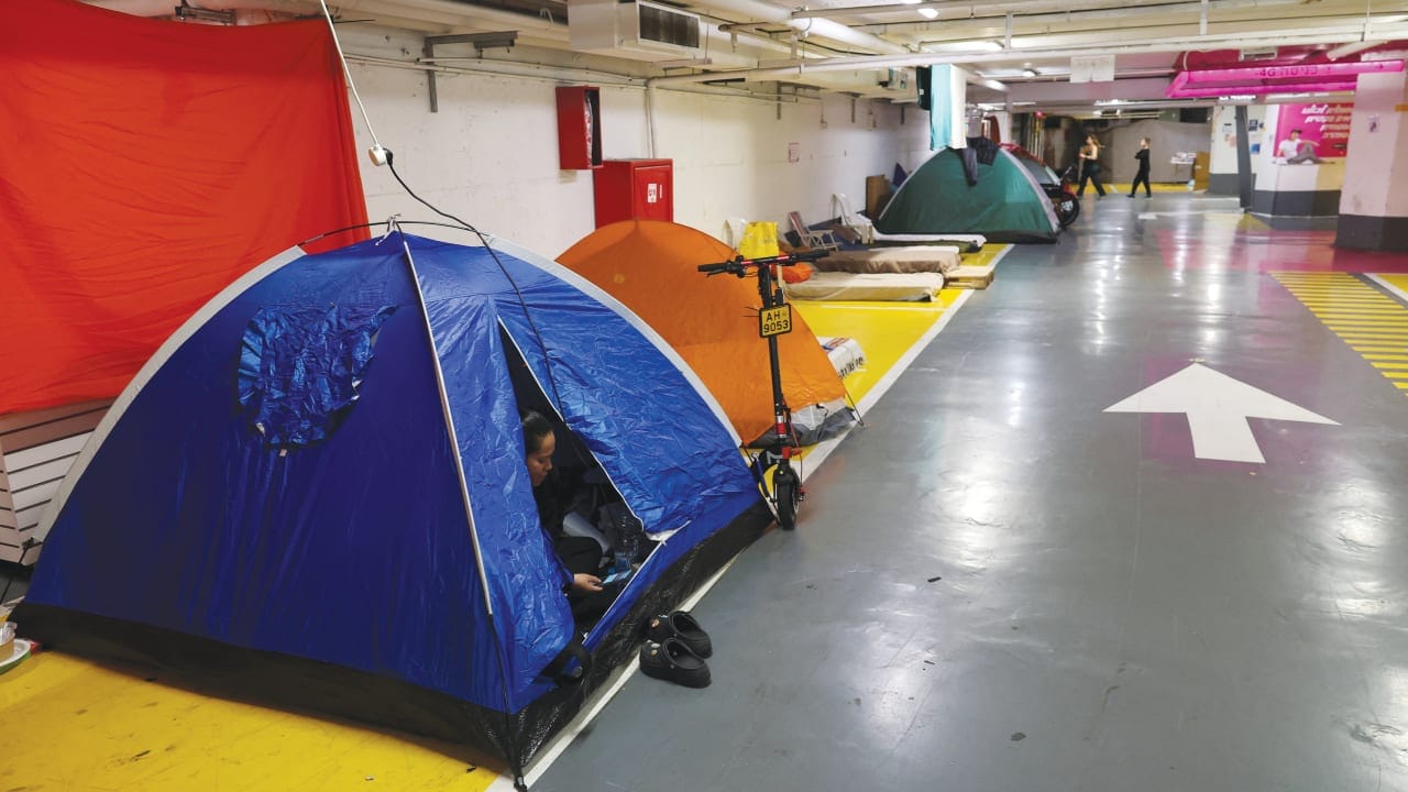 TENTS ARE set in an underground parking garage used as a public bomb shelter in Tel Aviv last month.