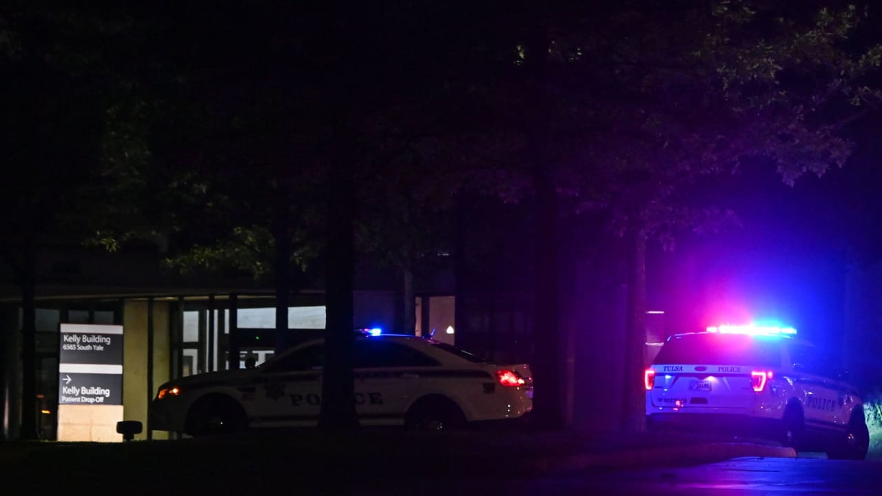Tulsa police cars block the entrance of the Natalie Medical Building at Saint Francis Hospital campus in Tulsa, Oklahoma, on June 1, 2022. 