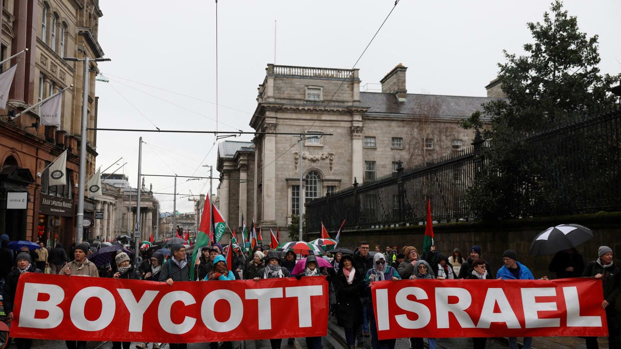 (ILLUSTRATIVE) DEMONSTRATORS HOLD banners in support of Palestinians during a protest in relation to the ceasefire in Gaza, in Dublin, Ireland, February 21, 2026.