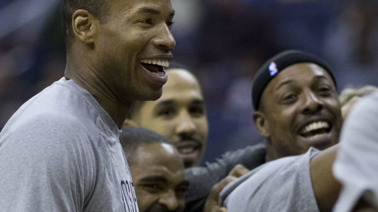 Jason Collins huddles with the Nets before playing the Washington Wizards in 2014.